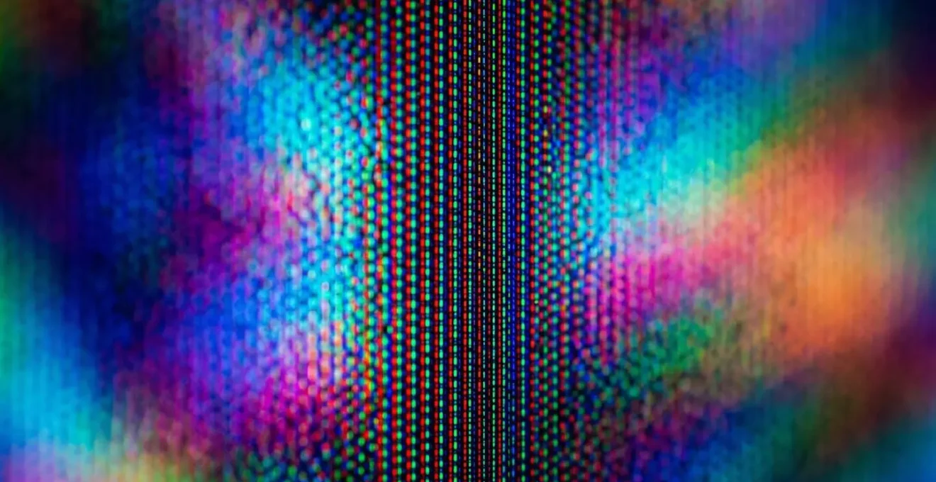 Vue macro d'une texture de pixels d'écran montrant la compression d'image